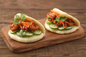Korean Pao.Bao buns with chicken crispy and vegetable. Asian cuisine