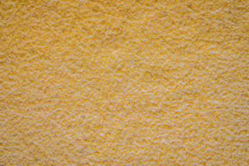 Close up detail of yellow wool fabric texture