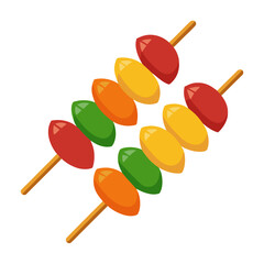 Colorful fruit skewers on white background yellow orange