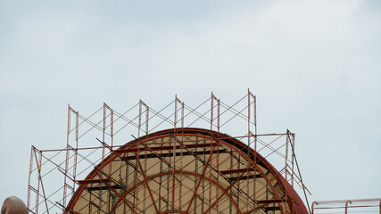 Abstract image of looking up at modern glass and concrete building. Architectural exterior detail of office building.