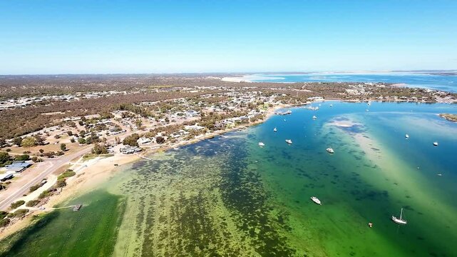 Top‑Down Flight Showing Grid‑Like Oyster Longlines and Turquoise Sea, Cinematic Aerial Reveal of Pristine Aquaculture Waters, South Australia, Slow Orbit Around Coffin Bay Pacific Oysters

