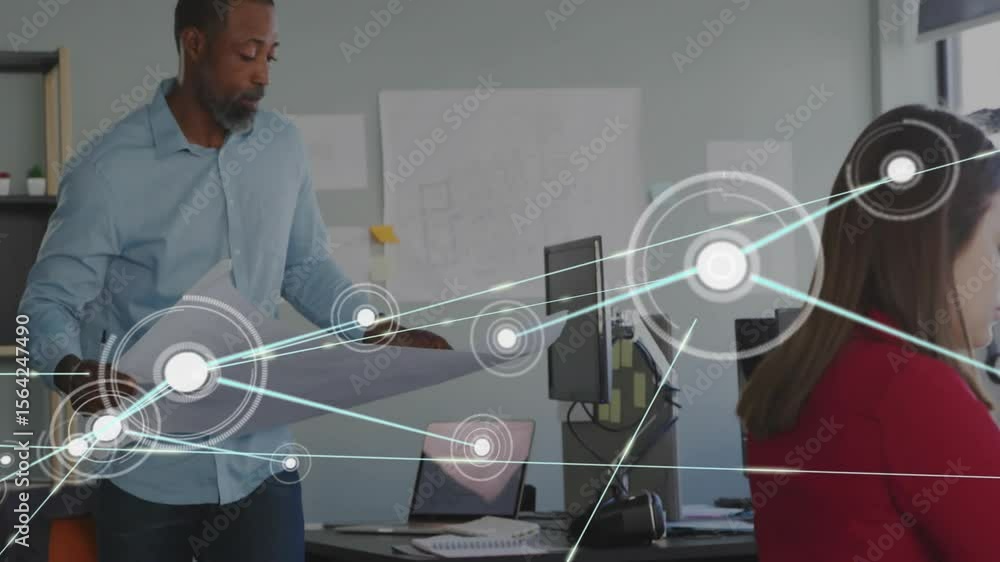 Poster engineer opening plans and growing animated nodes linking paper designs to computer monitor