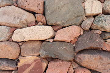 Detail of a robust pirca built with stones of various sizes and tones, reflecting the historic construction techniques of the Adobe Route in Tinogasta, Catamarca.