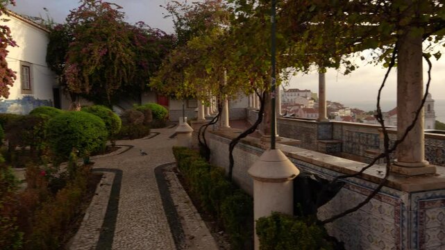 Female Traveler Walks to Balcony View Lisbon Portugal Sunrise Epic Viewpoint European City