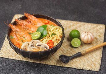 Tom yum kung with noodles , thai style instant spicy noodles with shrimp , noodles tom yum with...