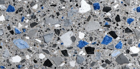 Close up of gray terrazzo with blue and white accents for interior design inspiration