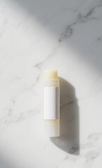 white lip balm no label in photo from above marble table