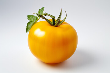 Bunch of small fresh yellow cherry tomatoes with green stems on white background top view flat lay