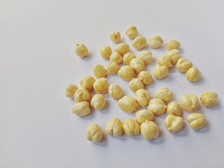 Ripe chickpeas isolated on white background.