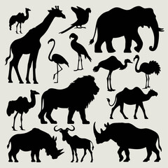 Collection of black animal silhouettes featuring a variety of wild and savanna species—elephants, giraffes, rhinos, antelopes, birds, and more—arranged on a white background in a compact grid layout.
