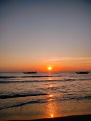 Fototapeta premium the view of sunset at Takalar, Indonesia