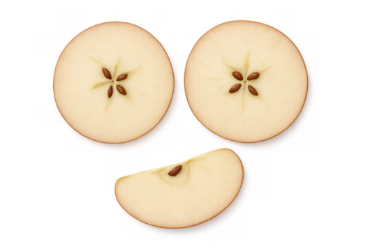 Fresh red apple slices exposing seeds, presenting natural texture and vibrant color on clear background