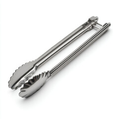 Stainless steel kitchen tongs resting on a clean countertop with a blurred background of a modern kitchen