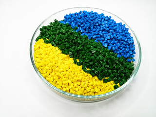 various colors of masterbatch granules in glass containers, polymer carrying resin and pigments...