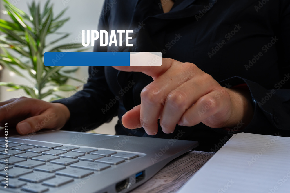 Aufkleber businesswoman in front of a computer pointing at a bar that counts the percentage of update progress