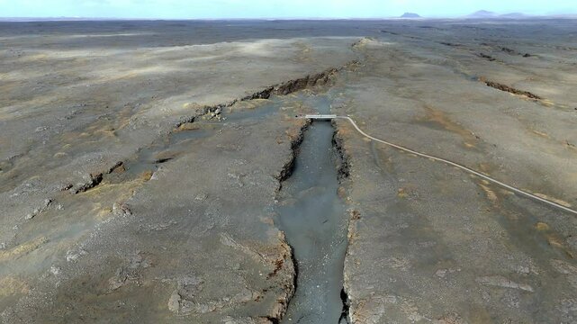 aerial above The Bridge between Continents footbridge spanning a rift between the Eurasian and North American tectonic plates Iceland