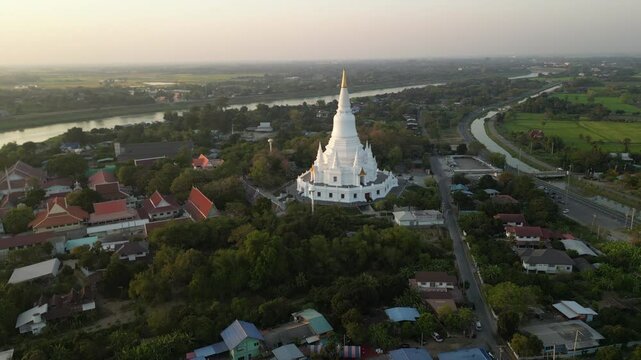 White Gold Pagoda Rural Central Thailand Sunset Drone Pull Back Pan 4K 60FPS