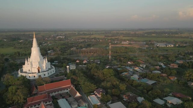 White Temple Complex In Rural Thailand At Sunset Drone Track Left 4K 60FPS