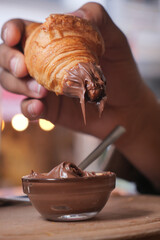 Delicious croissant filled with creamy chocolate spread