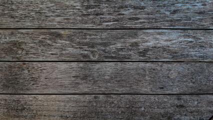 High-resolution rustic wooden plank texture with aged grain, knots, and weathered details in gray and brown tones. Ideal for backgrounds, vintage designs, nature themes, and raw, organic compositions