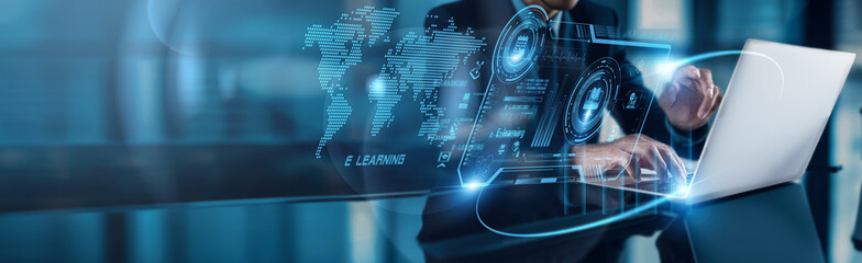 A businessman uses his laptop to analyze E-learning data, observing user engagement growth on the...