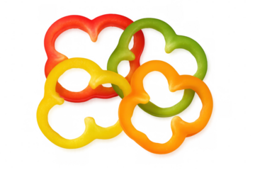 Vibrant bell pepper slices forming geometric pattern, transparently arranged for culinary graphic design applications