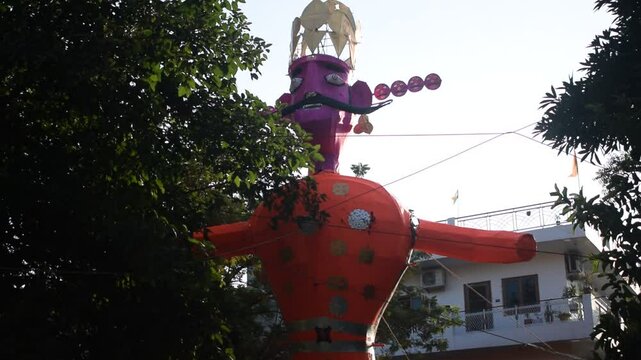 Ravnans being ignited during Dussehra festival at ramleela ground in Delhi, India, Big statue of Ravana to get fire during the Fair of Dussera to celebrate the victory of truth by Lord Rama