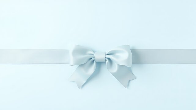 Elegant pale blue ribbon tied into a graceful bow presents a sophisticated and minimalist aesthetic on a coordinating background