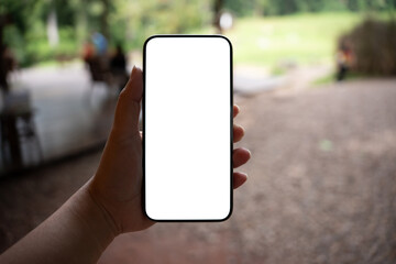 Smart phone mockup. Women hands holding cell telephone blank copy space screen smartphone blank white screen isolated technology concept.