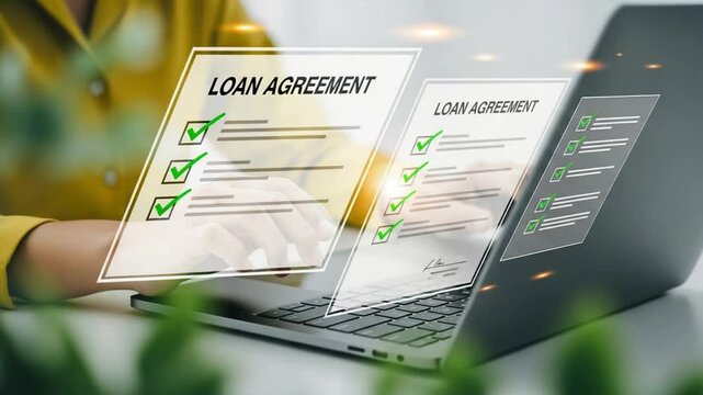 Person reviewing loan agreement with green checkmarks on a laptop computer at a bright desk