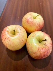 apples on a wooden table