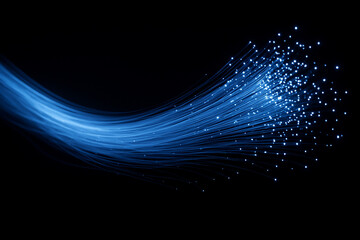AI generated image showing glowing fiber optic strands flowing across a dark background symbolizing high speed data transmission digital connectivity and abstract technology energy
