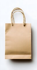 A minimalist kraft paper bag with jute handles placed against a clean white background. A small blank sticker is attached near the top, ideal for product branding or label mockups.

