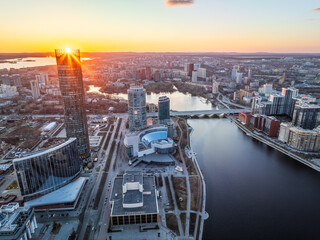 Yekaterinburg aerial panoramic view in spring at sunset. Yekaterinburg city and pond in spring or autumn.