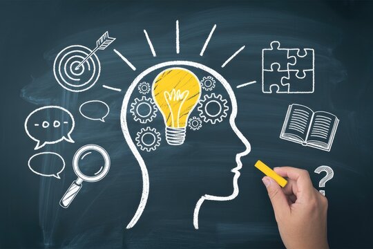 Chalk Drawn Head Silhouette with Light Bulb and Symbols on Chalkboard