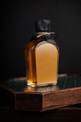 Whiskey Bottle on a Wooden Tray