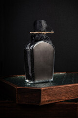 Whiskey Bottle on a Wooden Tray