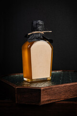 Whiskey Bottle on a Wooden Tray