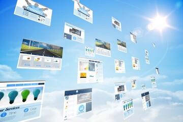 Screens showing business advertisement in blue sky