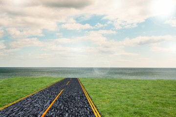 Paved two lane road is stretching toward sea in flat design scene, highlighting green grass fields