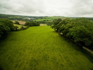 Green landscape against sky