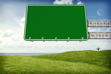 Showing blank green highway sign hanging on truss over grassy hill, water, tree in flat design
