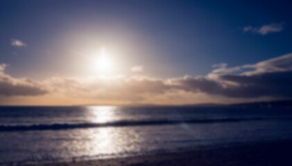 Obraz premium Ocean against sky during sunset