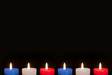 Candles on black background