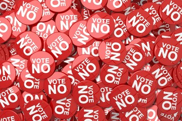 Flat design is showing pile of overlapping red campaign buttons displaying bold VOTE NO message