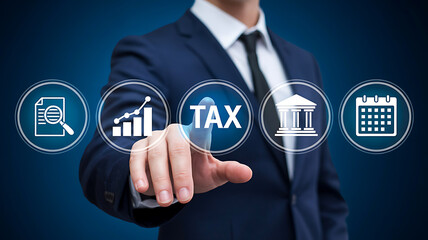 Businessman touching virtual tax icon interface with financial and legal symbols on blue background