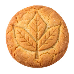 Golden brown sugar cookie with a detailed embossed leaf pattern in the center isolated on transparent background