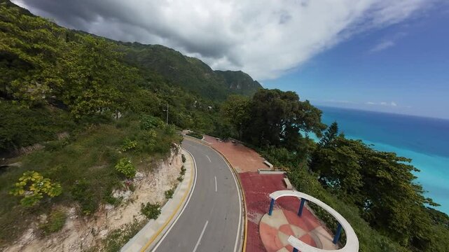 A scenic coastline with lush greenery