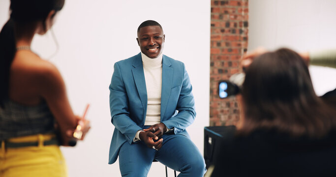 Smile, photography and shooting with man in studio for business fashion, about us and profile picture. Professional branding, career photoshoot and behind the scenes with people on set for production