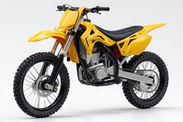Obraz premium Bright yellow dirt bike with knobby tires and black seat showcased against a clean white background